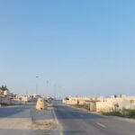 صورة توضح منطقة الجزيرة الحمراء بتراثها التاريخي ومبانيها المميزة.