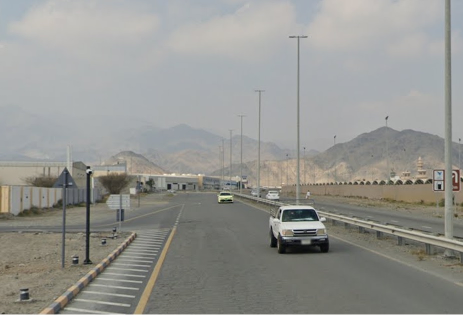 صورة من منطقة الحيل تُظهر المباني السكنية الحديثة والشوارع الواسعة مع المساحات الخضراء المحيطة.